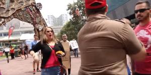 Women's Marcher Punchs Trump Supporter